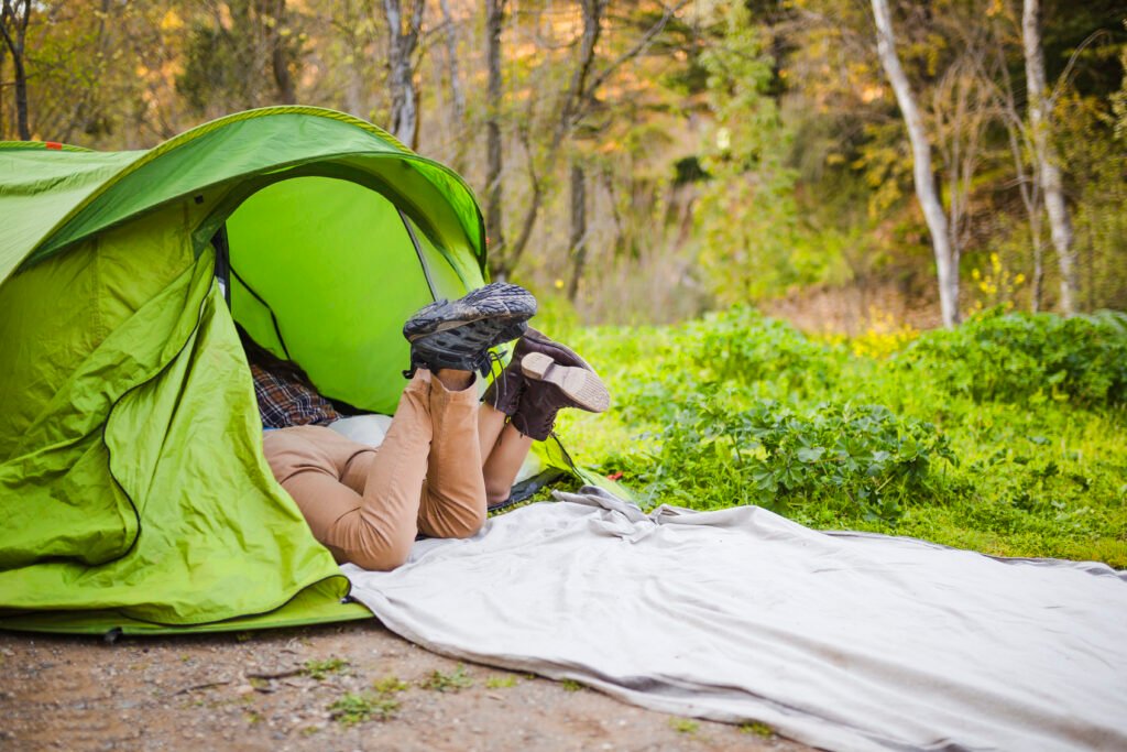 crop-couple-resting-tent