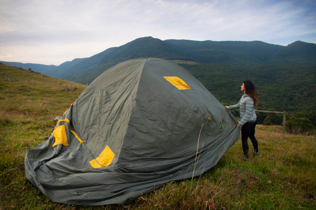 side-view-adventurous-woman-bivouacking